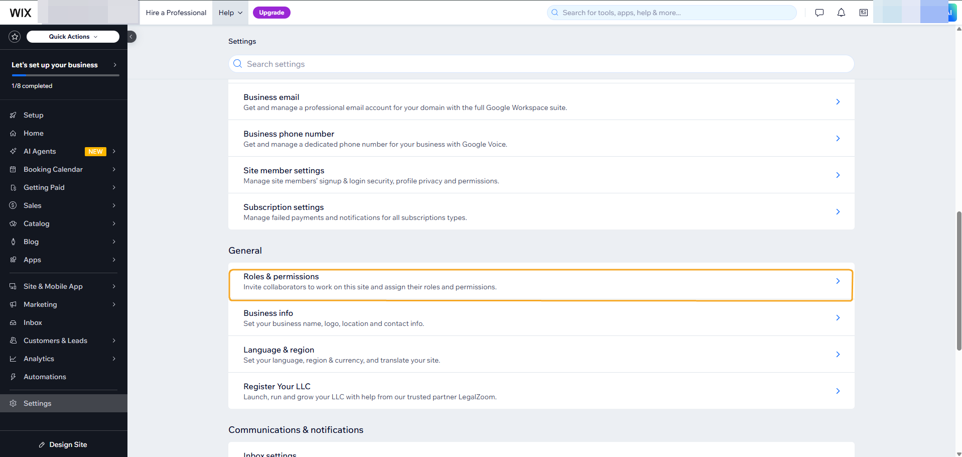 Wix Settings screen with Roles and permissions highlighted under the General section